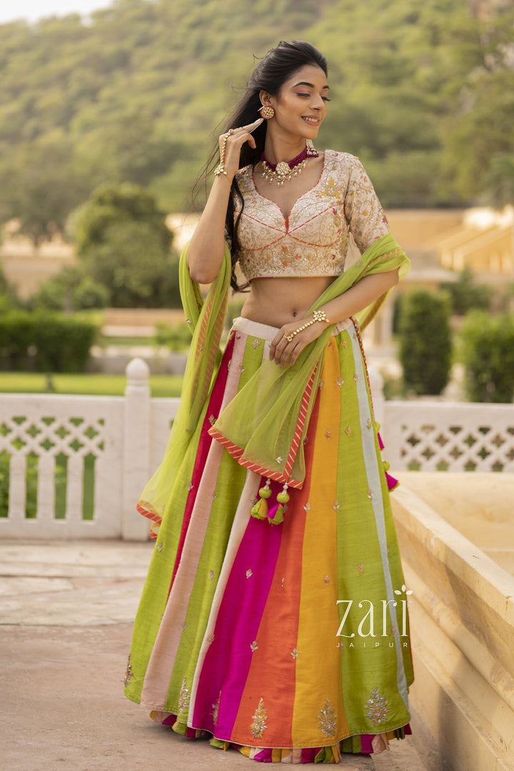 Raw silk Lehenga with Gota Patti, Thread, Zardozi work.