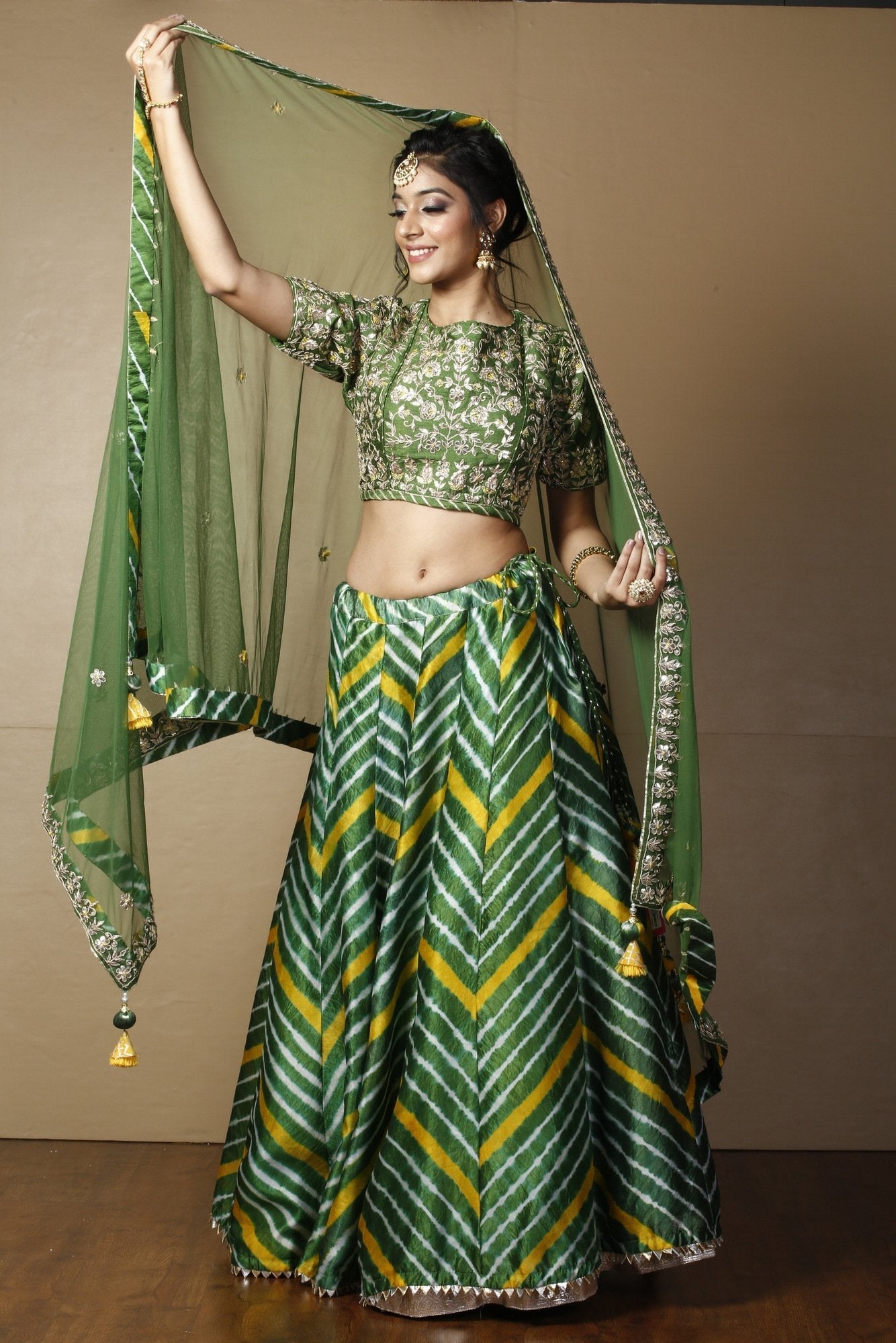 Tussar silk Lehenga in Dark Green color with Gota Patti, Thread, Zardozi work.