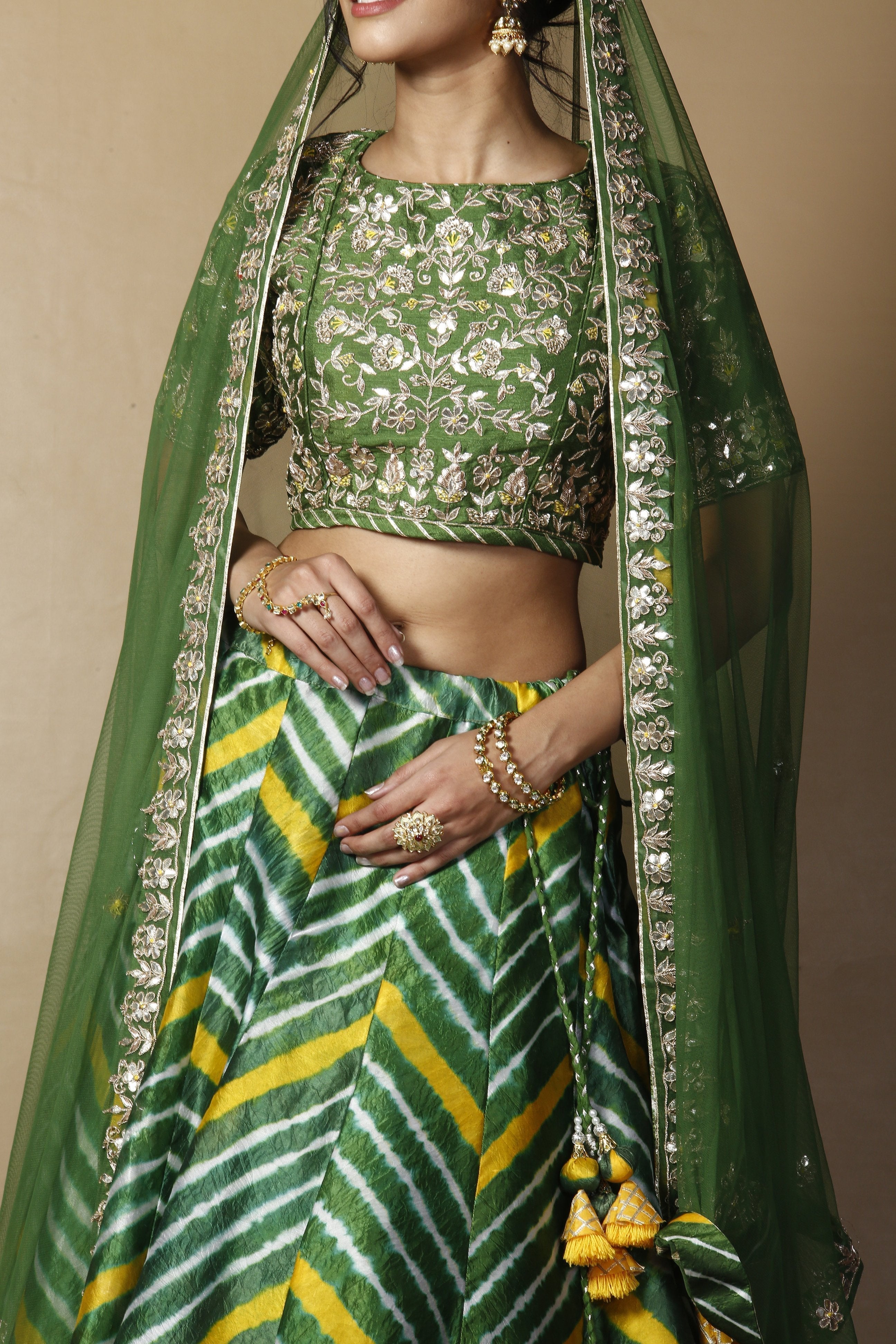 Tussar silk Lehenga in Dark Green color with Gota Patti, Thread, Zardozi work.