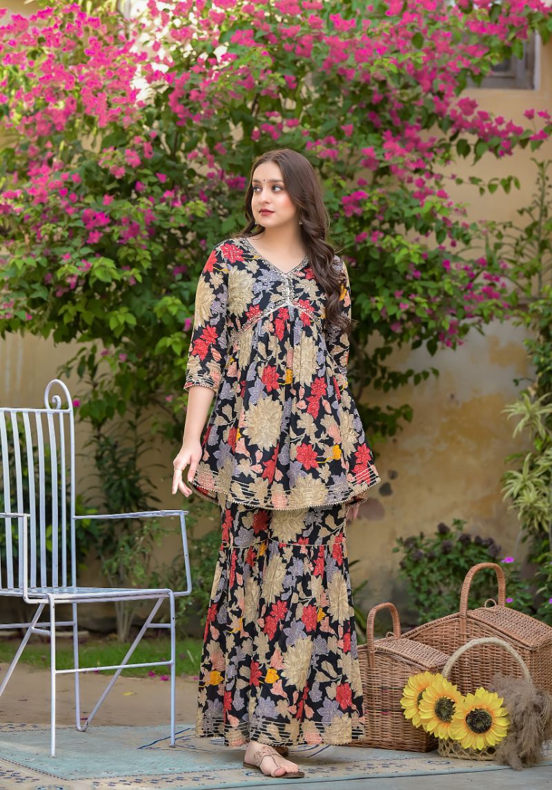 Printed Peplum Style Muslin Kurta Set with Sequins work.