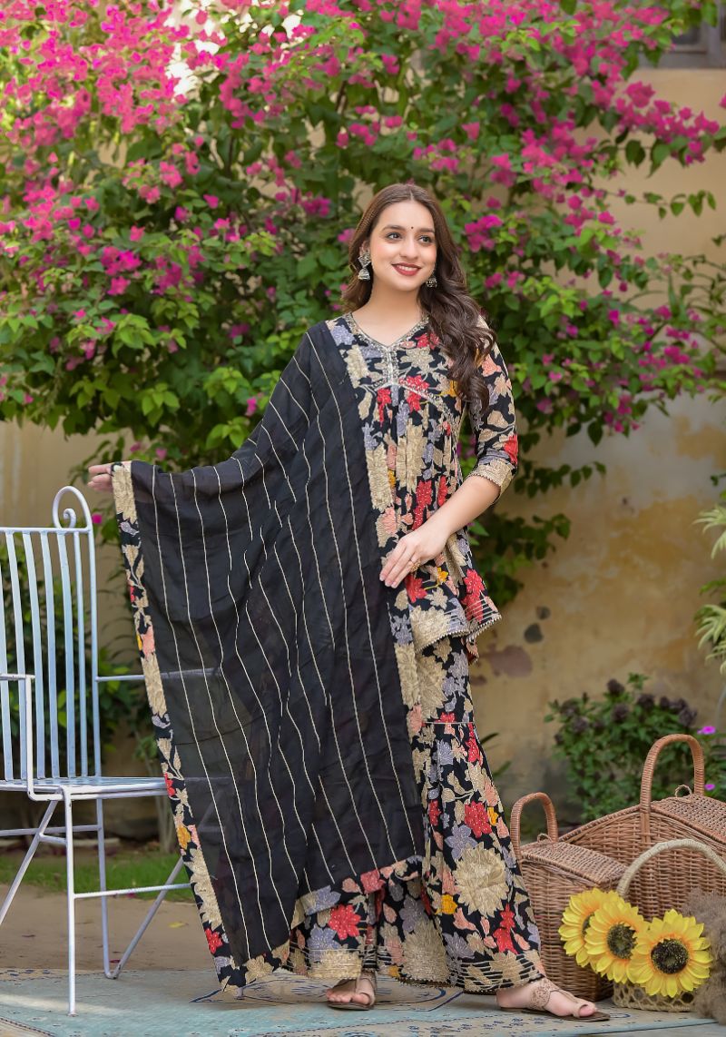 Printed Peplum Style Muslin Kurta Set with Sequins work.