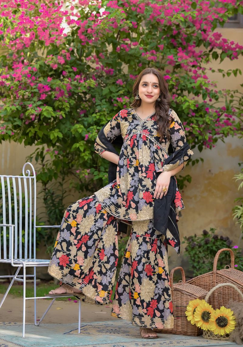 Printed Peplum Style Muslin Kurta Set with Sequins work.