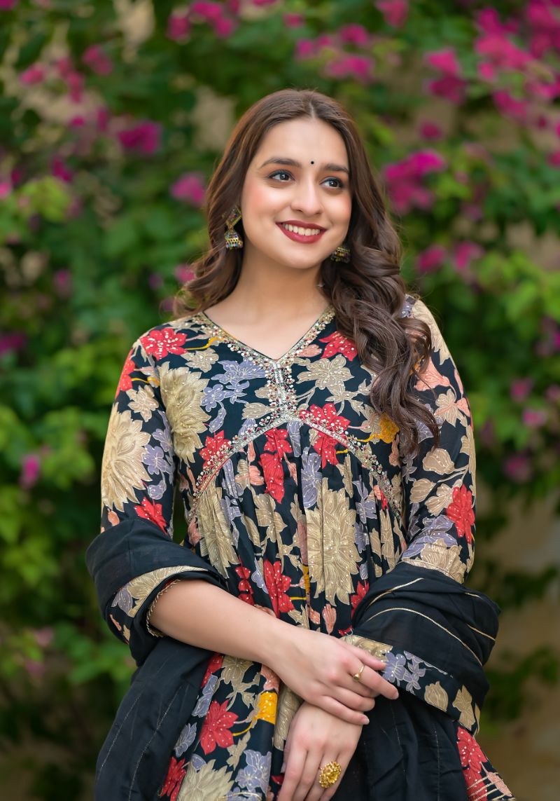 Printed Peplum Style Muslin Kurta Set with Sequins work.