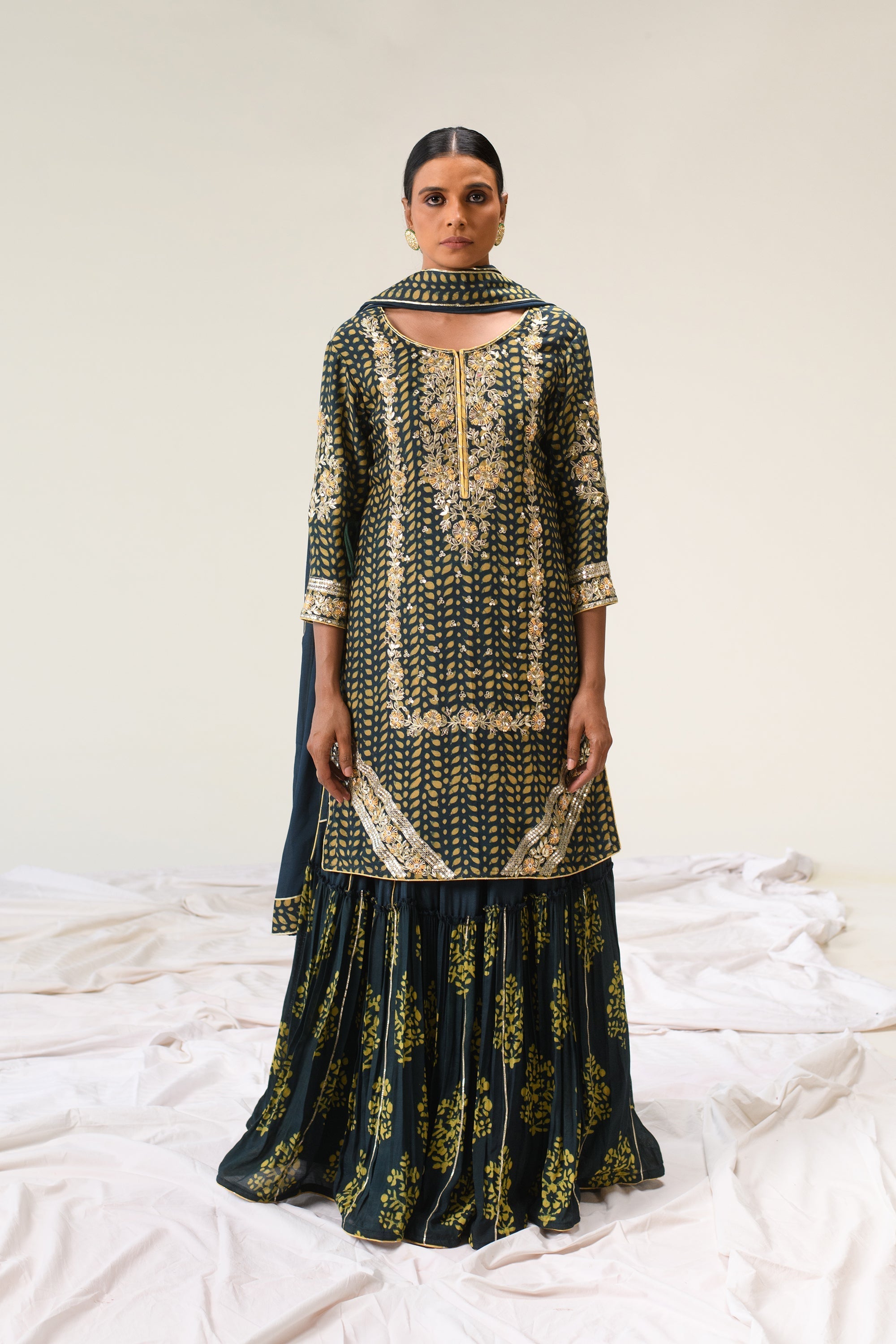 Cotton Silk Dabu Print Suit with Hand Aari work.