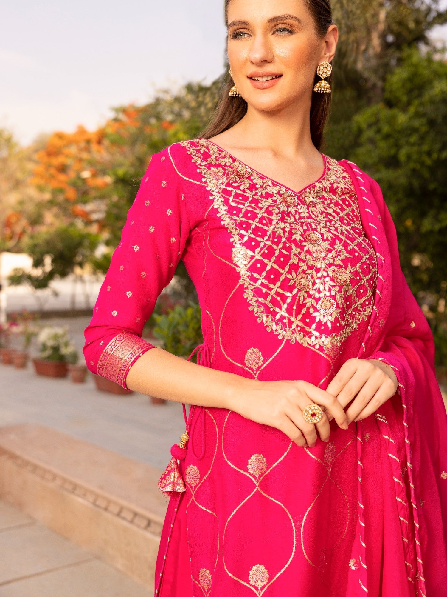 Handloom Dola Silk Suit Stitched with Gota Patti work.