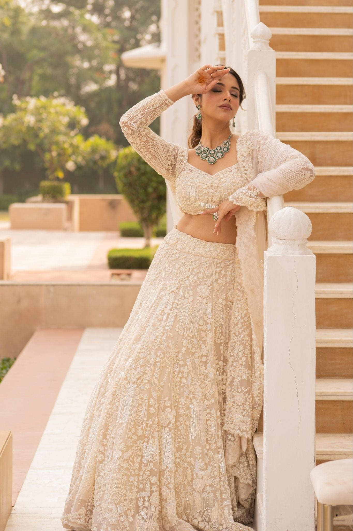 Elegant Net Lehenga Embroidered with Pearl, Sequins and Stone work.