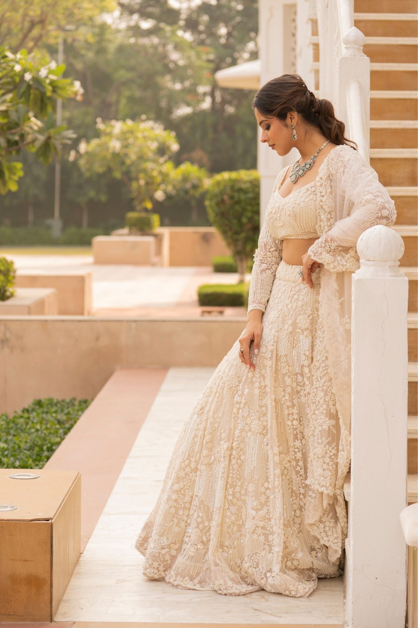 Elegant Net Lehenga Embroidered with Pearl, Sequins and Stone work.