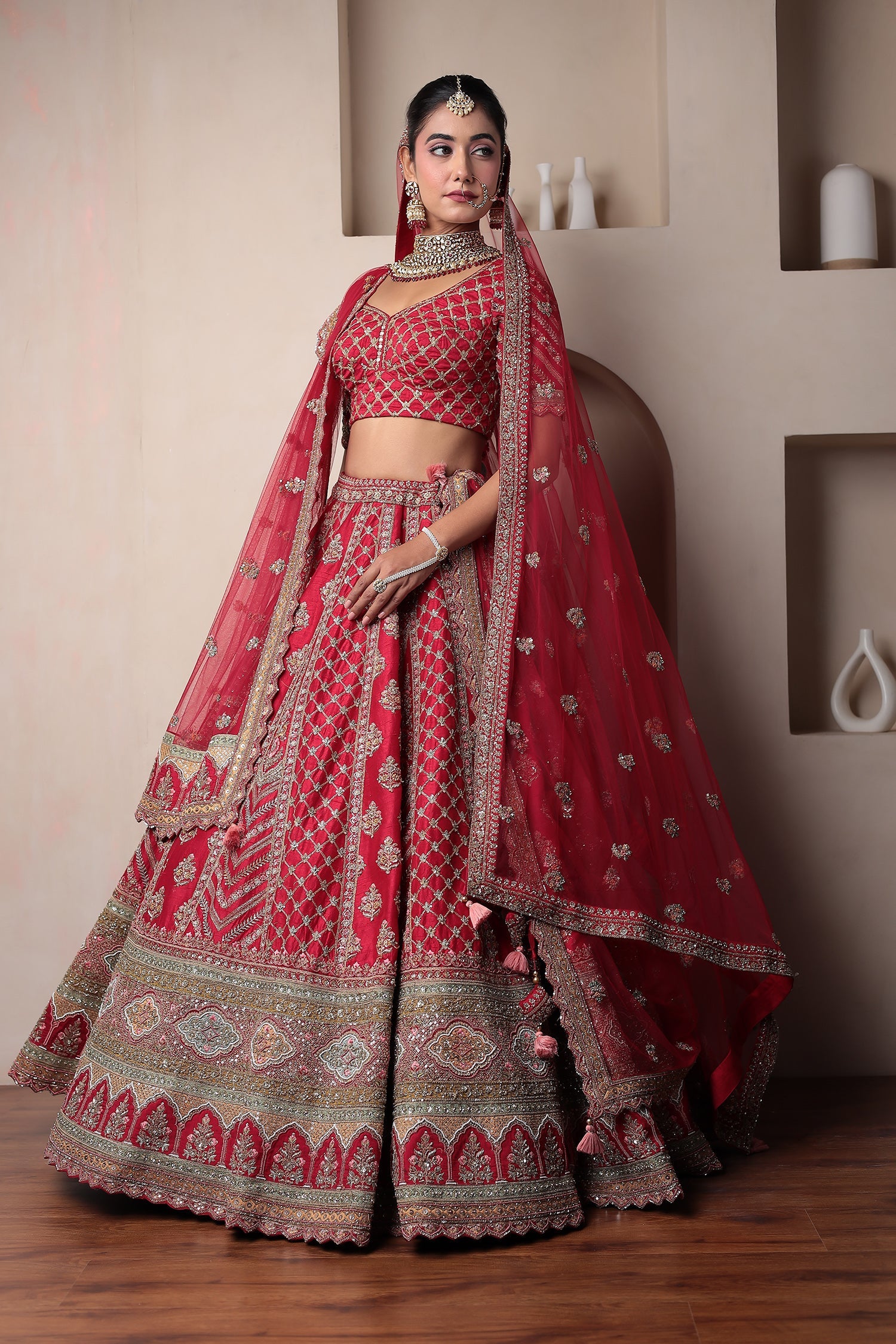 Raw Silk Bridal Lehenga Embellished with Thread and Zardozi work