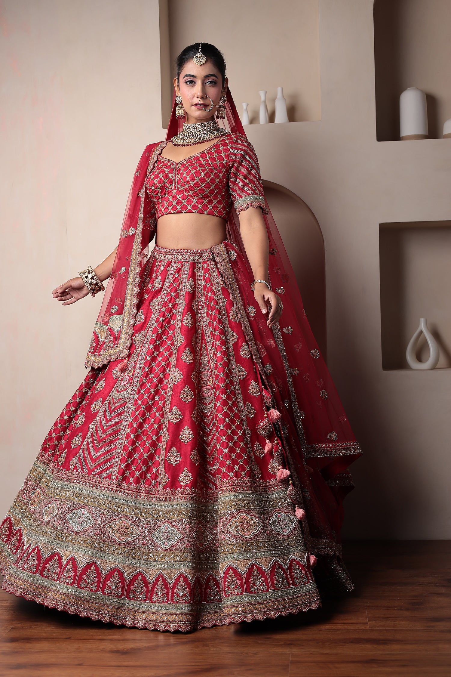 Raw Silk Bridal Lehenga Embellished with Thread and Zardozi work