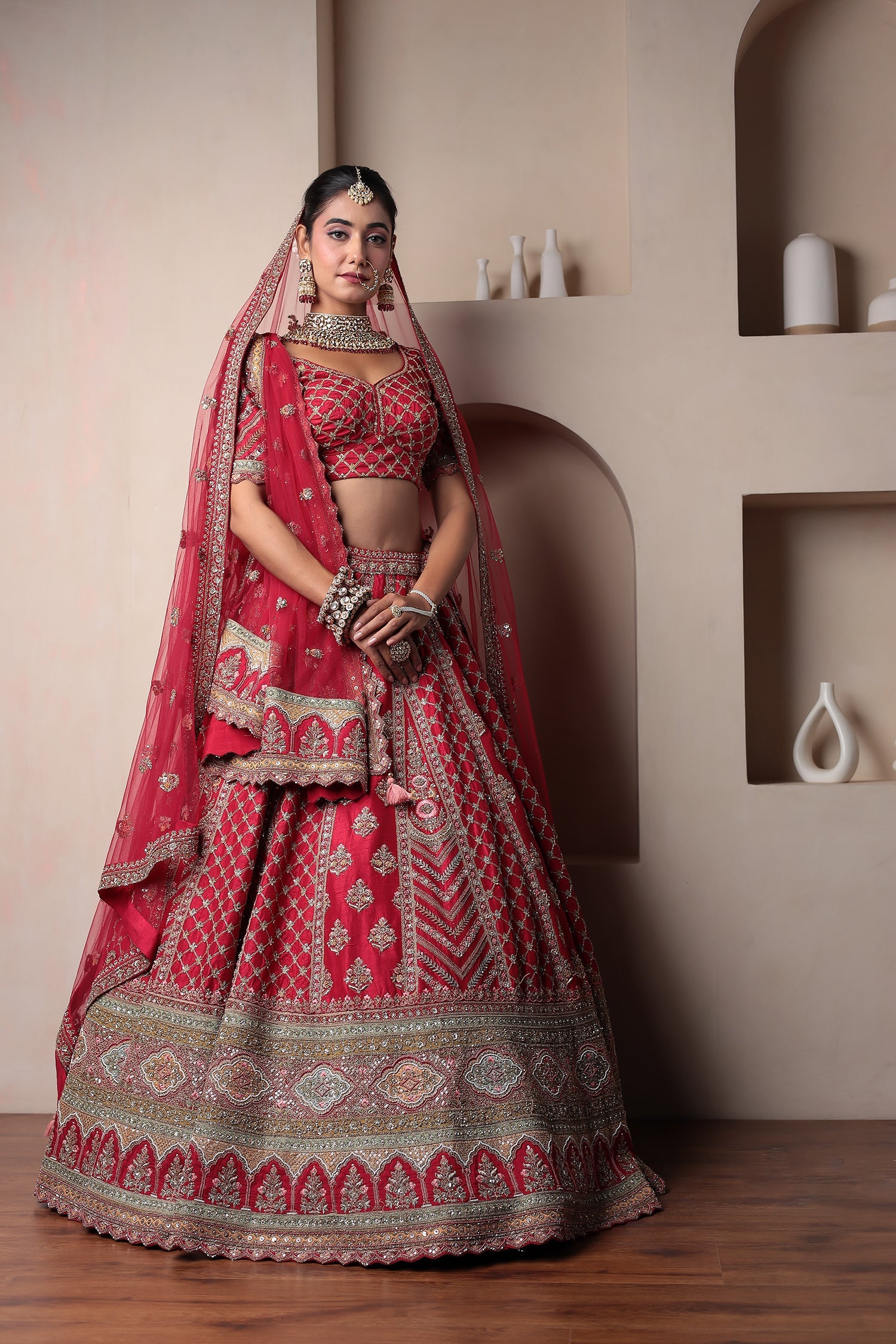 Raw Silk Bridal Lehenga Embellished with Thread and Zardozi work