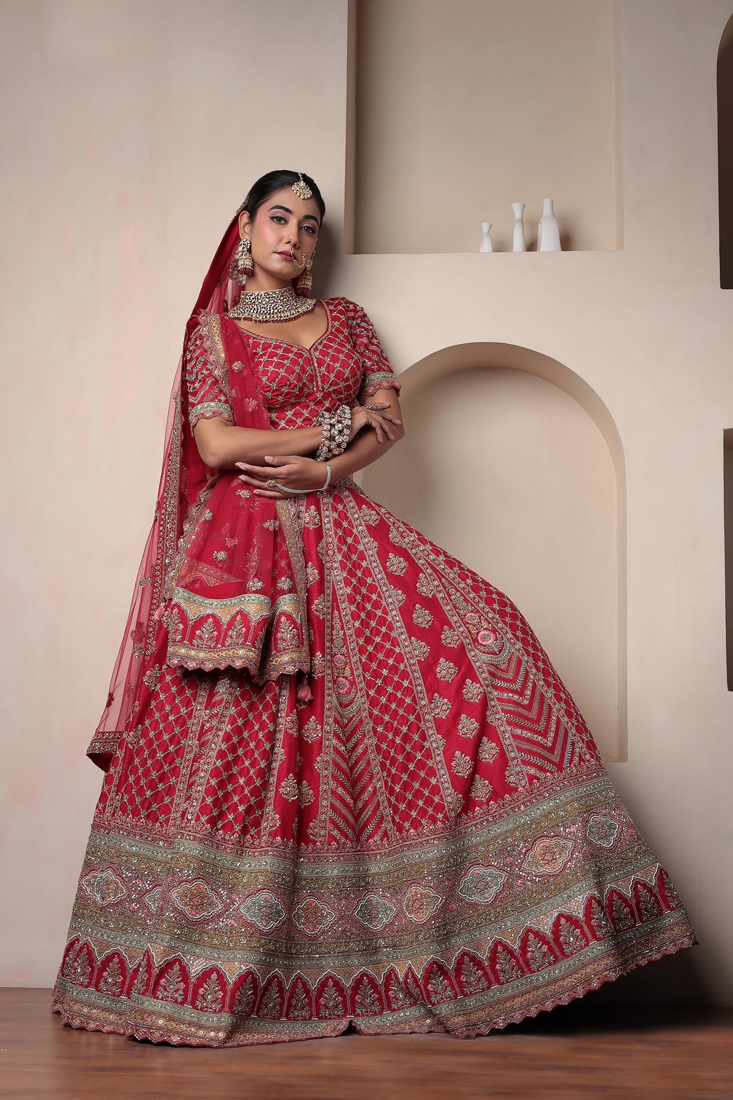 Raw Silk Bridal Lehenga Embellished with Thread and Zardozi work