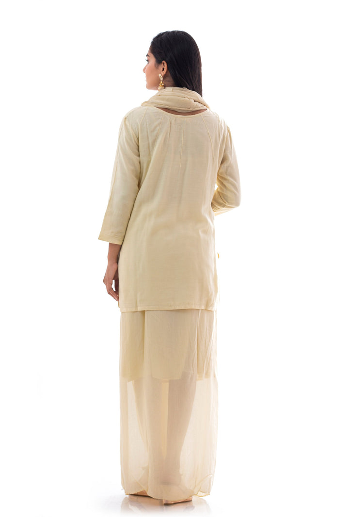 Suits in Cream color with Sequins work.