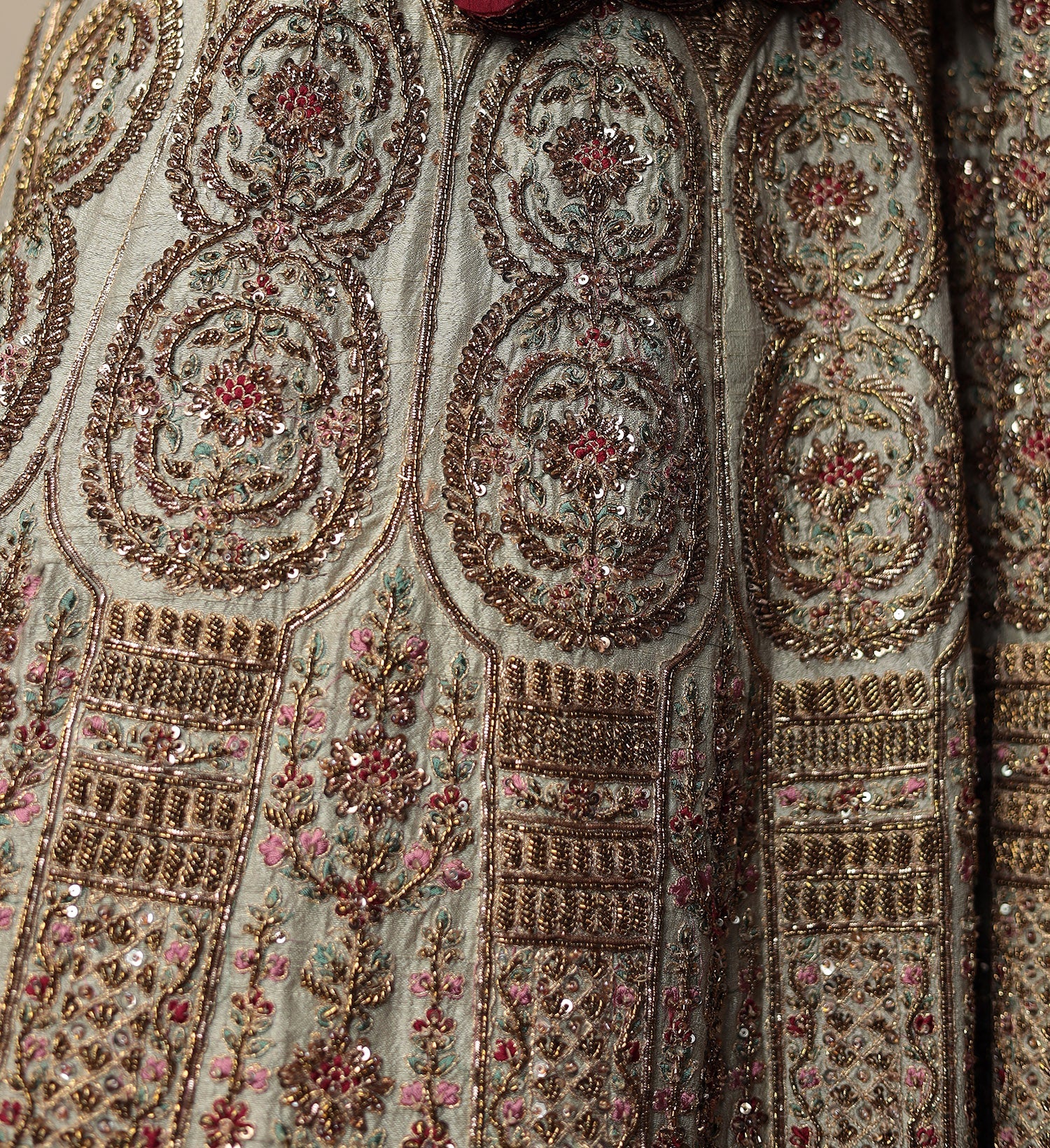 Raw Silk Bridal Lehenga Traditionally Enhanced with Contrast Bandhej Dupatta