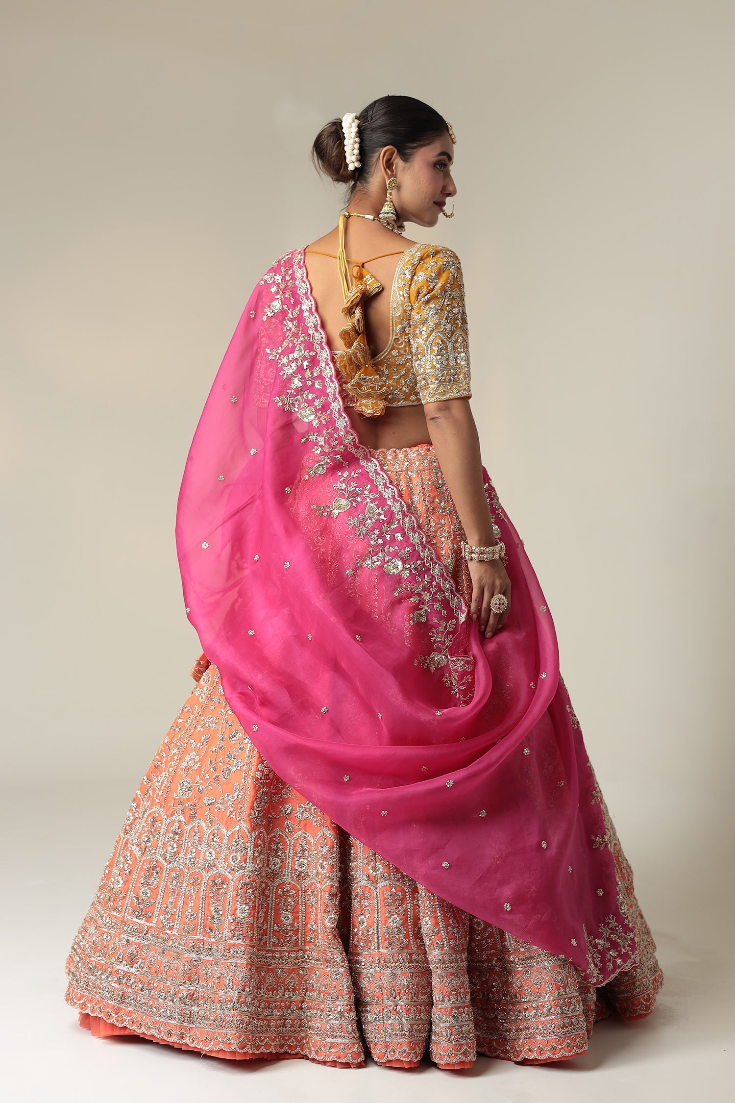 Organza Lehenga Embellished with Cutdana and Zardozi work