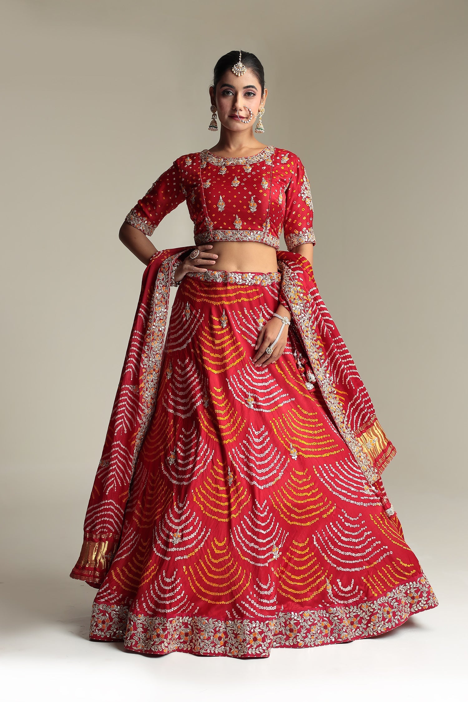 Satin Bandhej Lehenga Embroidered with Gota Patti work