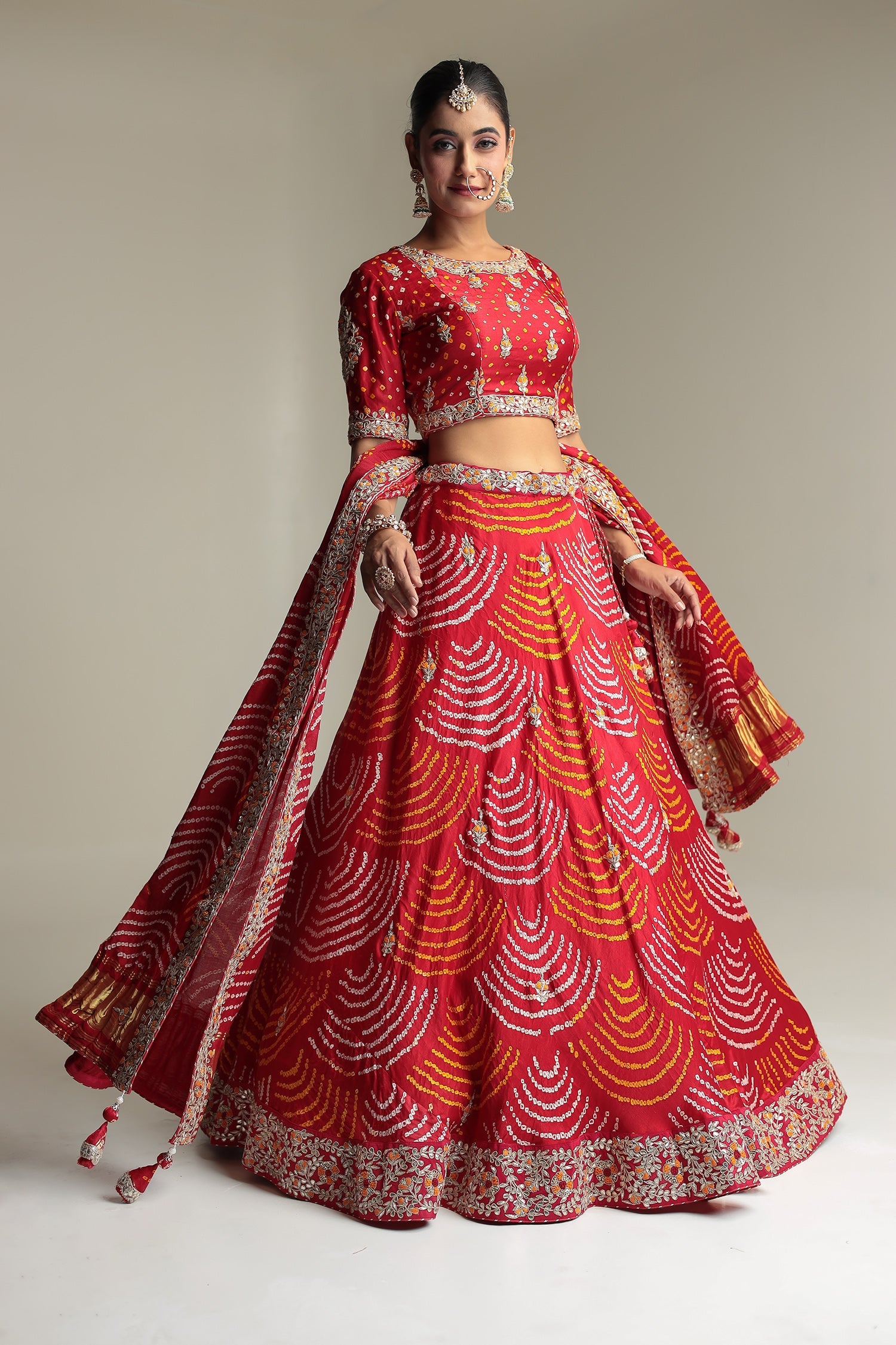 Satin Bandhej Lehenga Embroidered with Gota Patti work