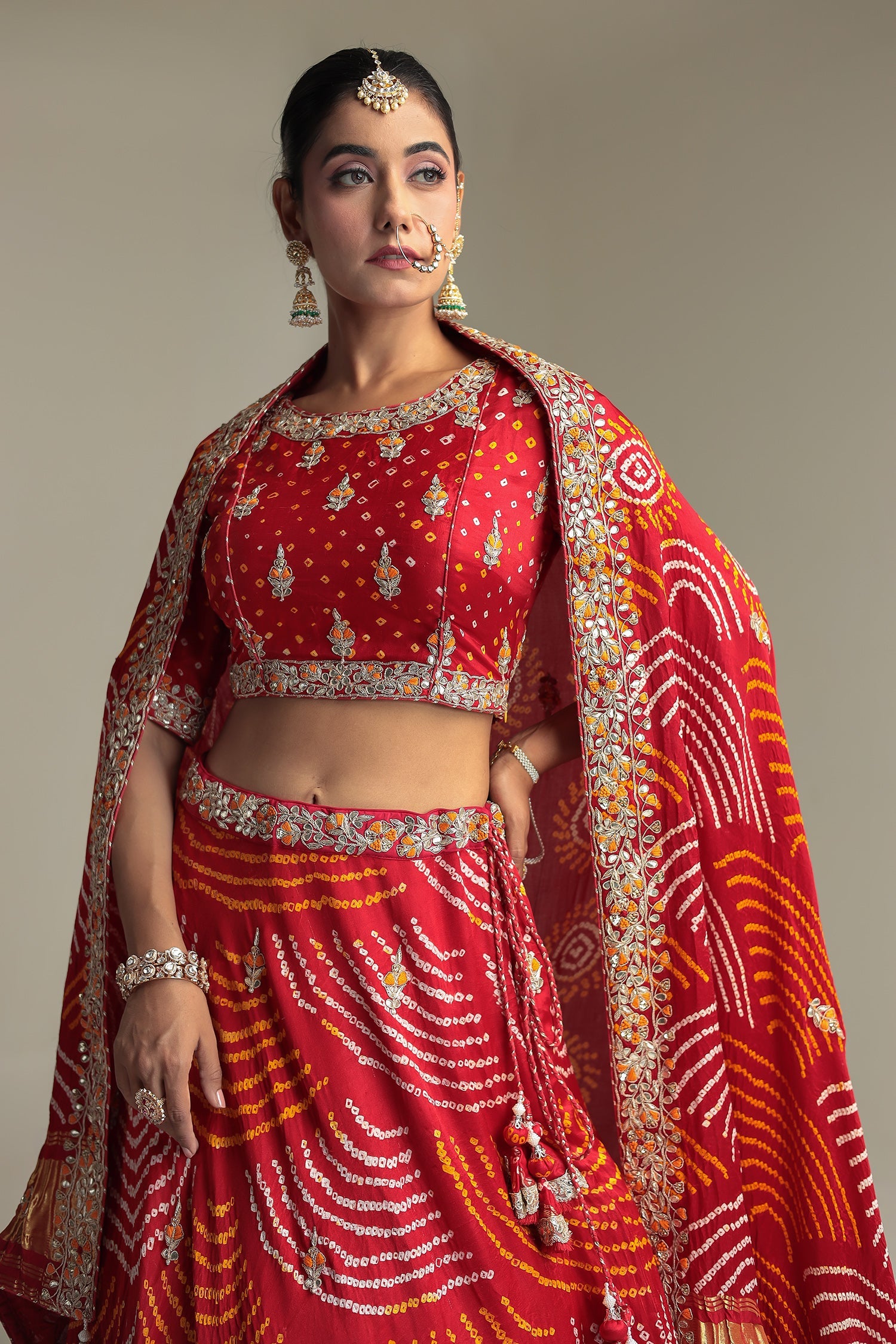 Satin Bandhej Lehenga Embroidered with Gota Patti work