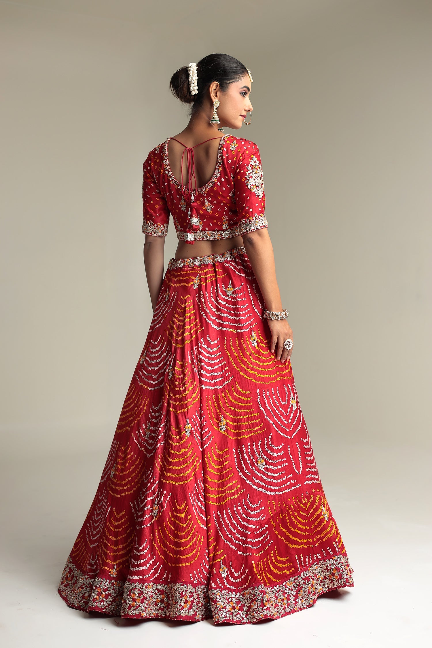 Satin Bandhej Lehenga Embroidered with Gota Patti work