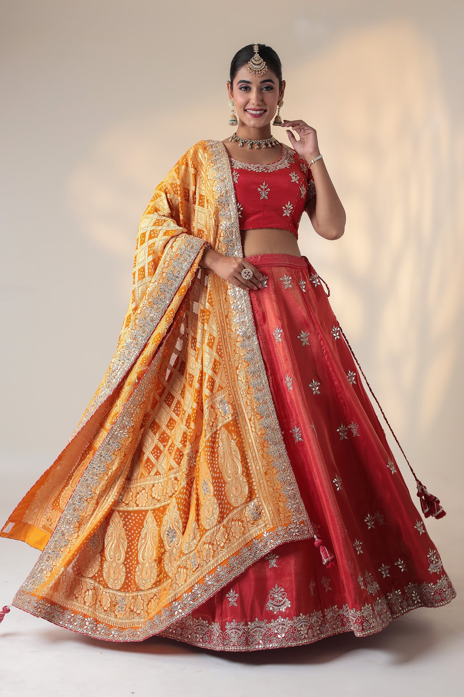 Tissue Lehenga Embellished with Gota Patti and Pearl work