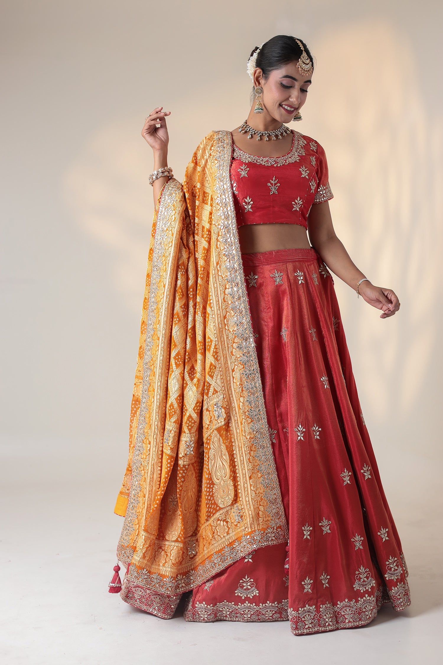 Tissue Lehenga Embellished with Gota Patti and Pearl work