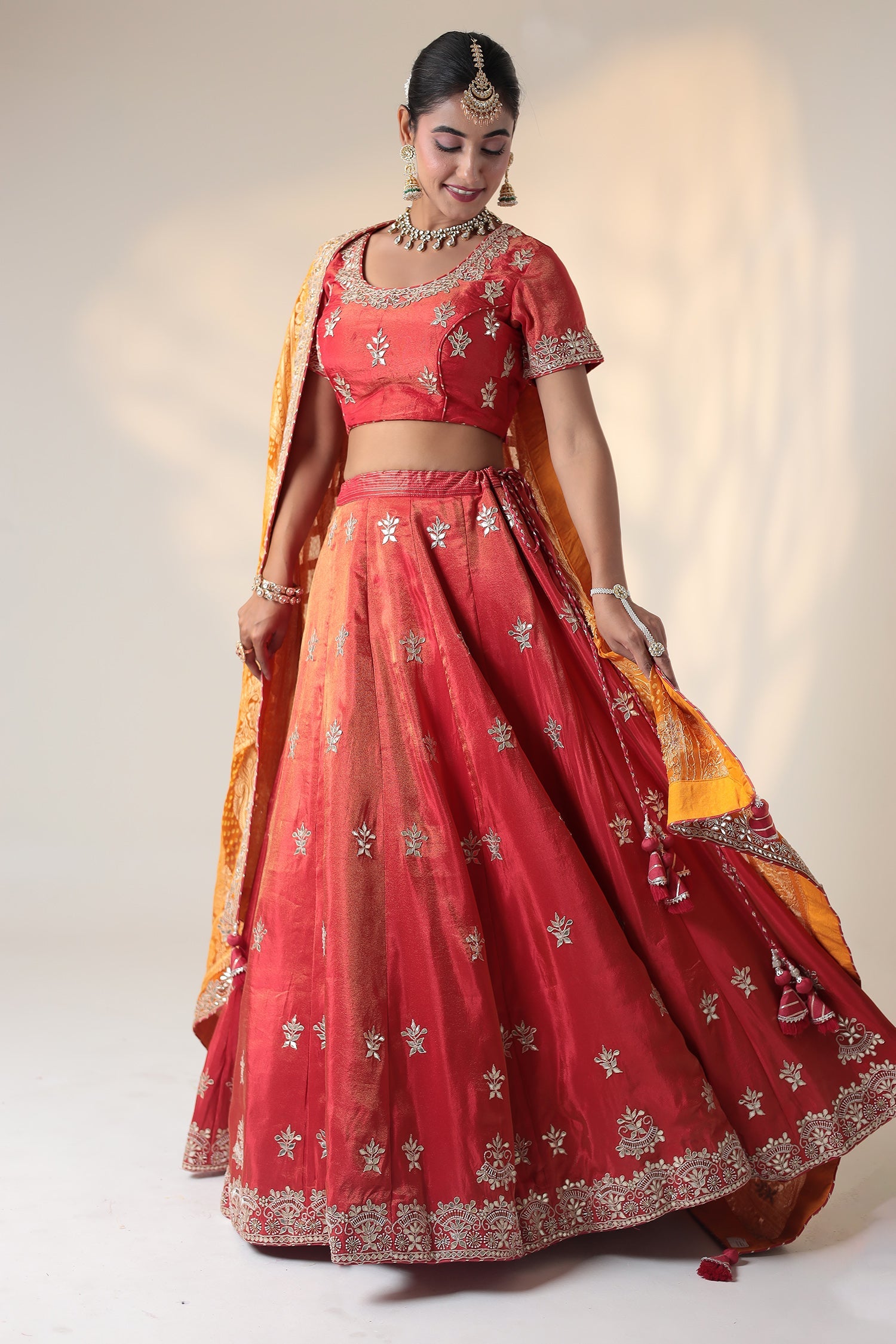 Tissue Lehenga Embellished with Gota Patti and Pearl work