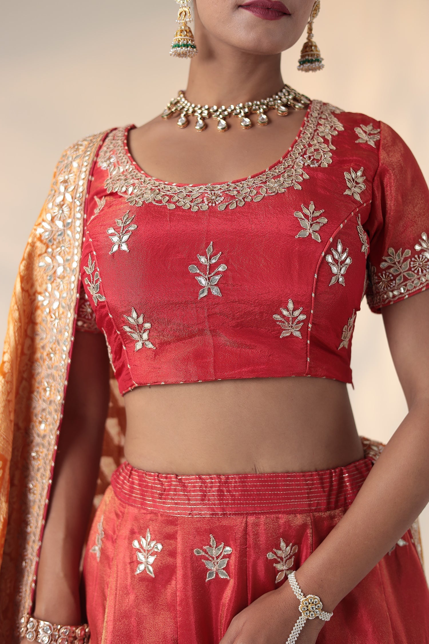 Tissue Lehenga Embellished with Gota Patti and Pearl work