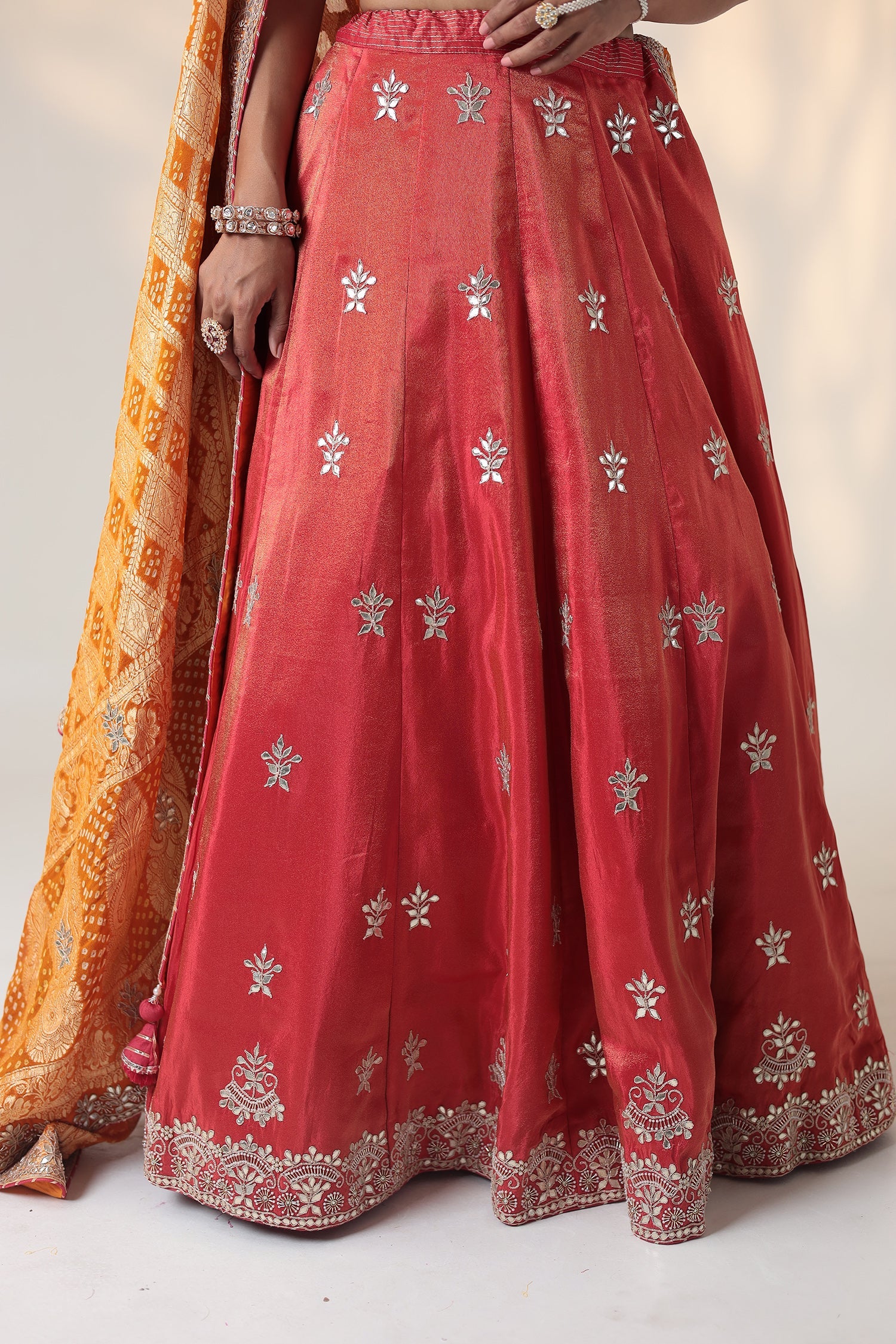 Tissue Lehenga Embellished with Gota Patti and Pearl work