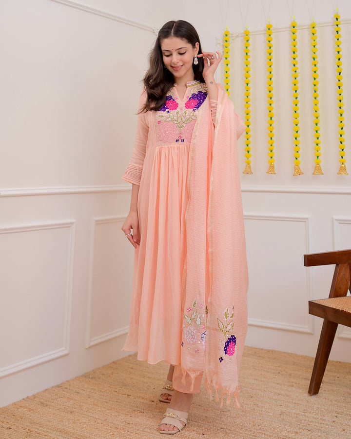 "Get festival-ready in this gorgeous peach Anarkali salwar suit 💃! Flowy Georgette with intricate embroidery on dupatta 🌸. Perfect for weddings, mehndi, or any festive occasion 🎉. Shop now!