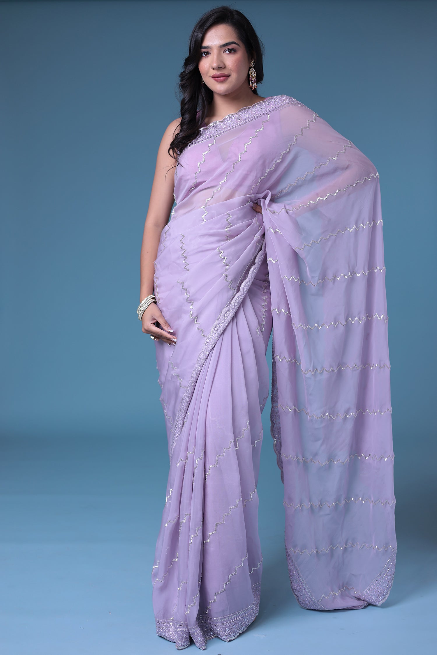Embroidered Organza Saree with Cutdana work.