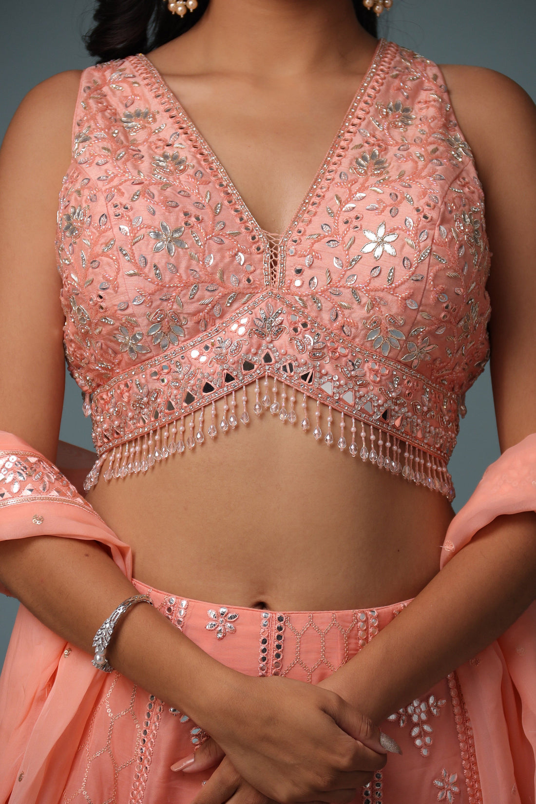 Organza Lehenga with Mirror and Embroidered work.