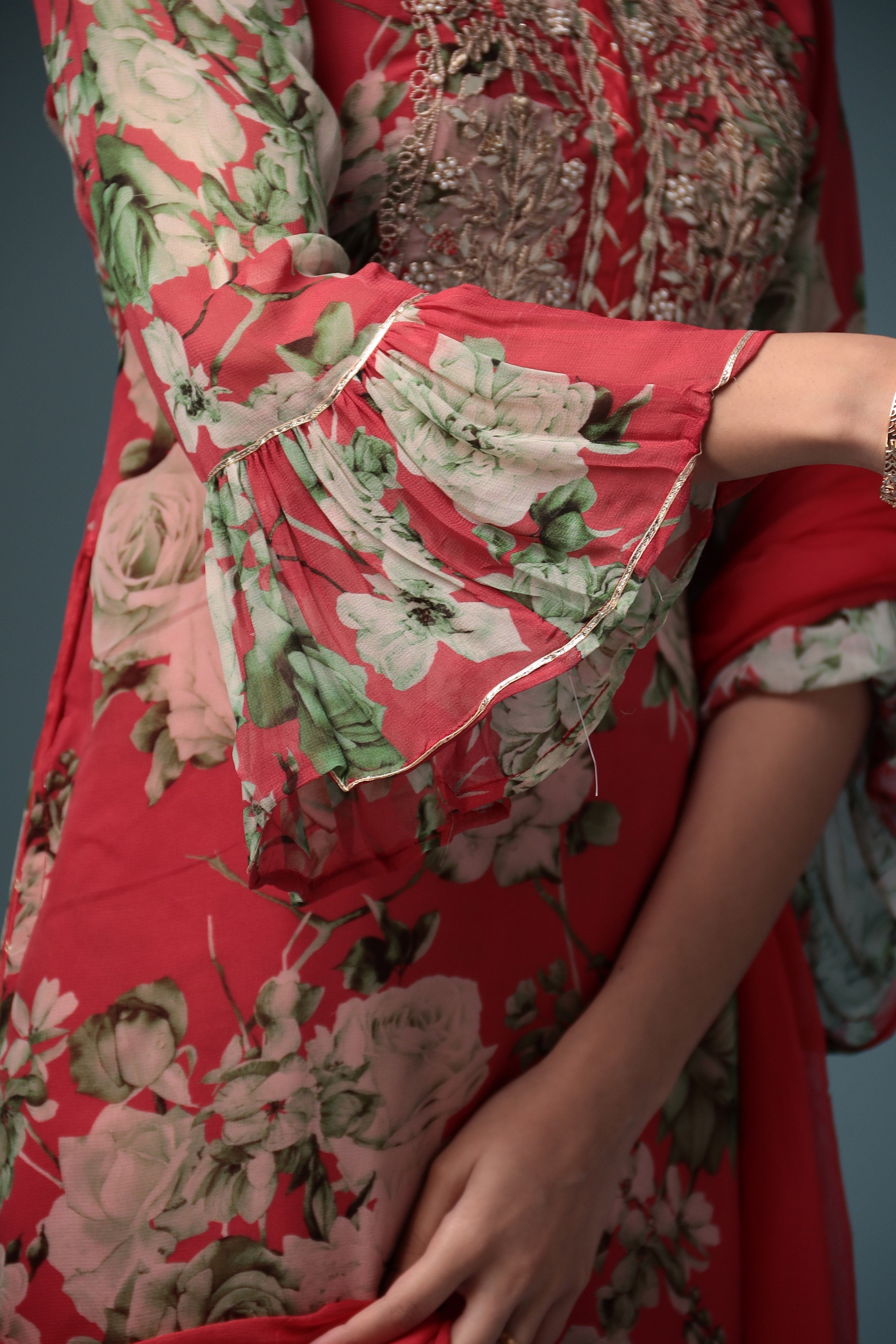 Printed Georgette Sharara Suit with Gota Patti work.