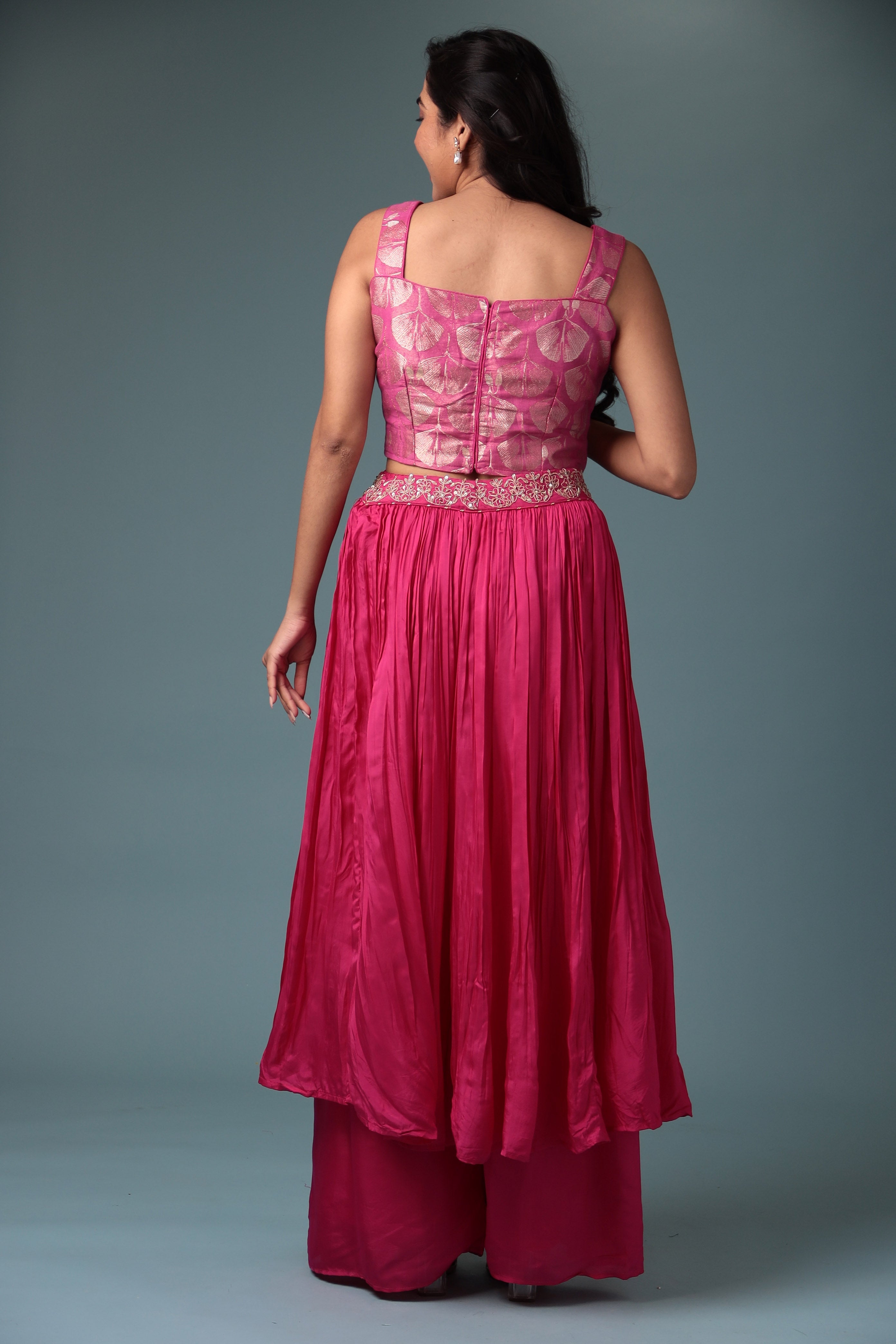 Exquisite Crop Top with Palazzo and a Draping Skirt Embellished with Zari and Dori work